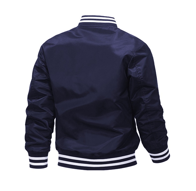Custom silk varsity jacket with satin lining and embroidery by Strage Clothing