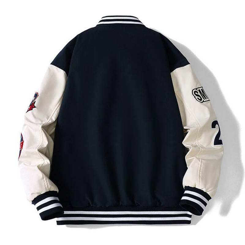 A detailed view of high-density chenille custom varsity jacket patches, featuring fuzzy textures and crisp embroidery on a felt backing.