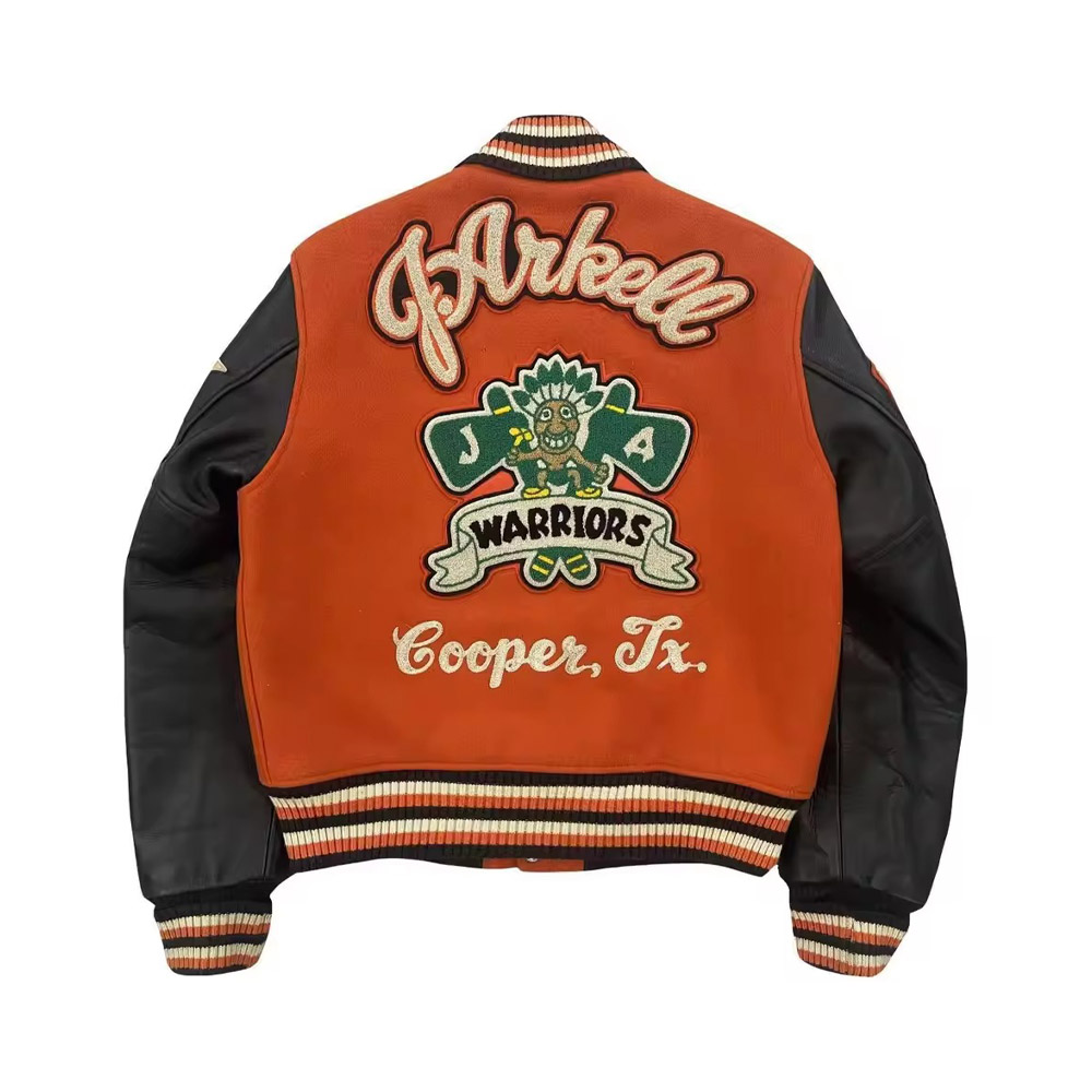 A detailed view of a premium custom-sports-team-varsity-jacket- featuring a high-quality wool body, genuine leather sleeves, and a custom-embroidered team mascot on the back.