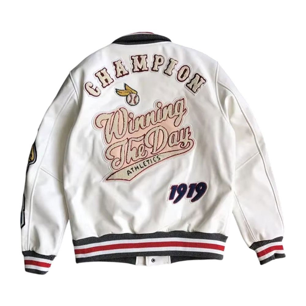 A detailed view of a premium custom-sports-team-varsity-jacket- featuring a high-quality wool body, genuine leather sleeves, and a custom-embroidered team mascot on the back.