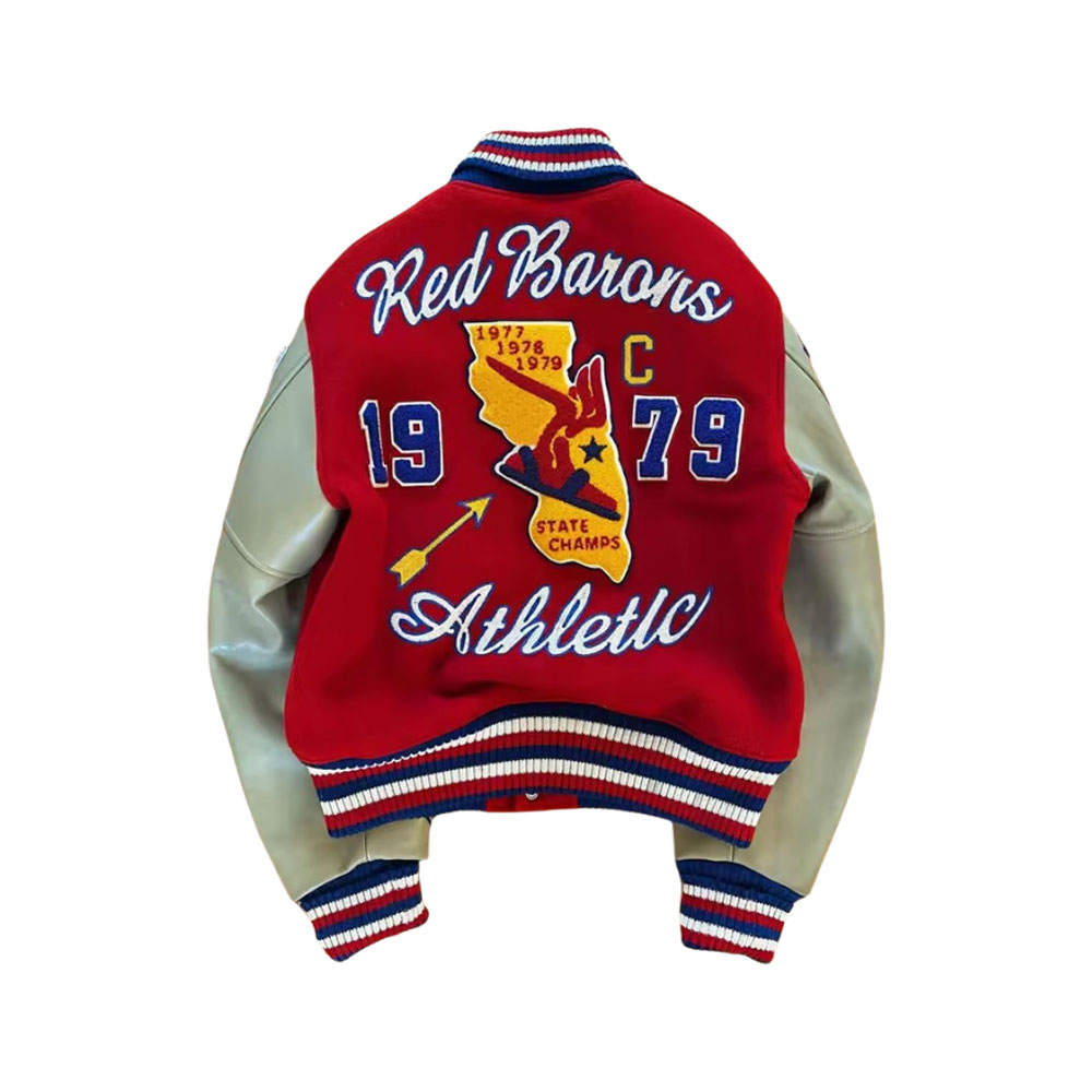 A detailed view of high-quality custom varsity sports jackets featuring wool bodies, genuine leather sleeves, and intricate chenille patch embroidery.