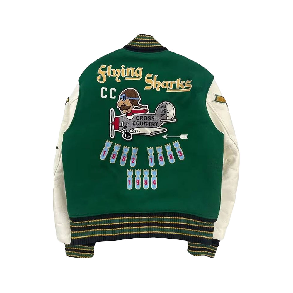 A detailed view of a sleek custom nylon varsity jacket featuring a satin-finish water-resistant shell, striped rib-knit cuffs, and precision embroidery.